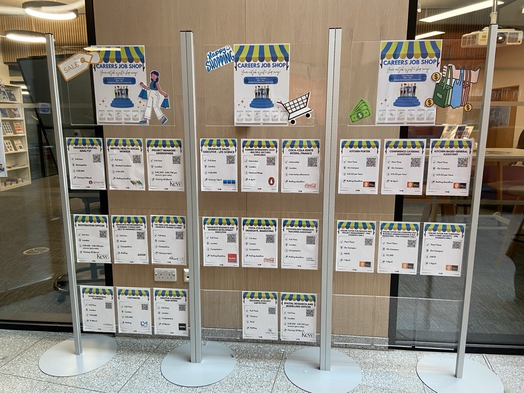 Infinitree stand with Careers Job Shop posters and leaflet dispensers
