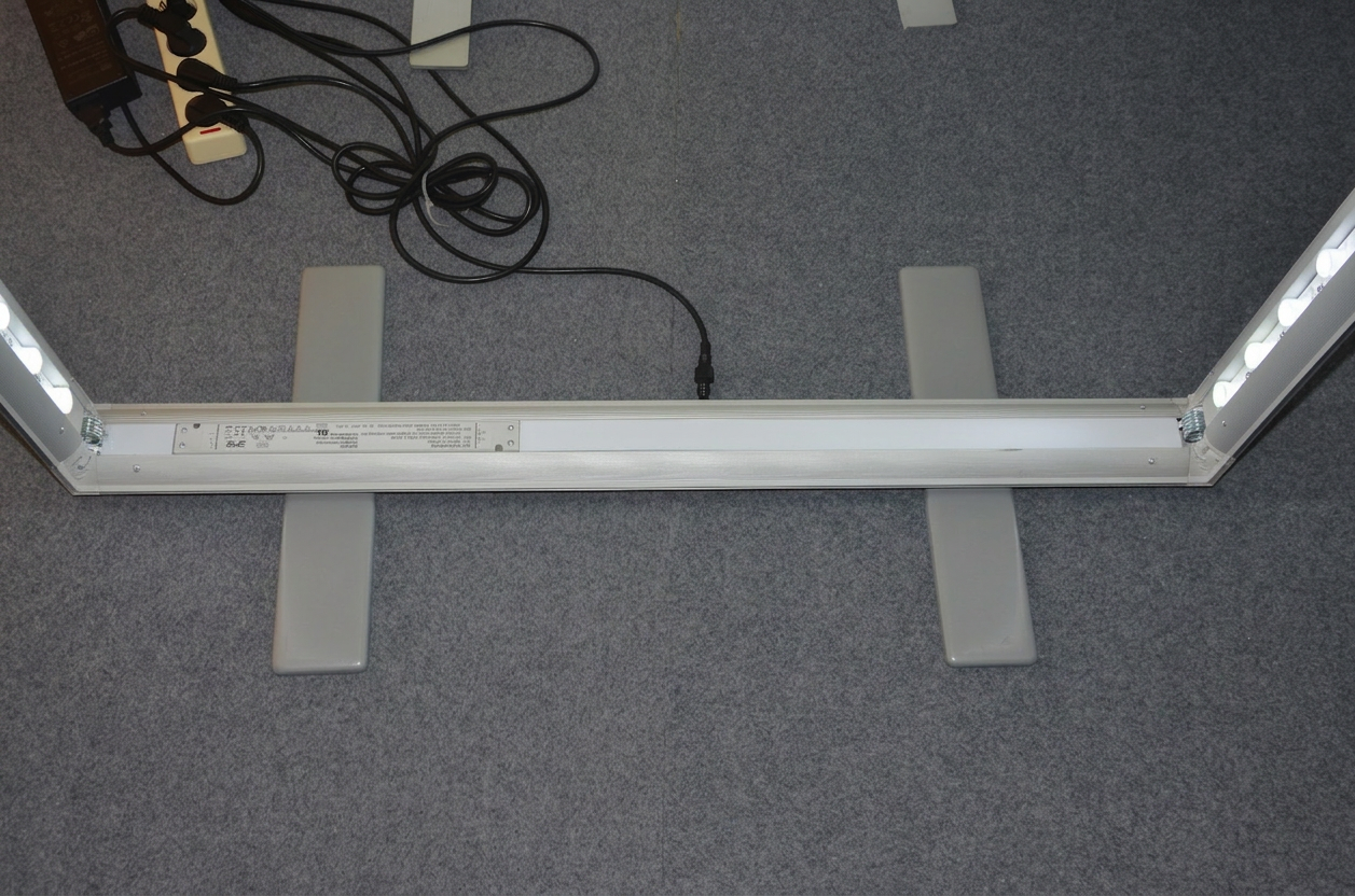 Integrated LED bar, transformer and folding metal feet